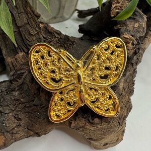 AAI vintage gold tone butterfly, EUC. Beaded metal filigree wings.